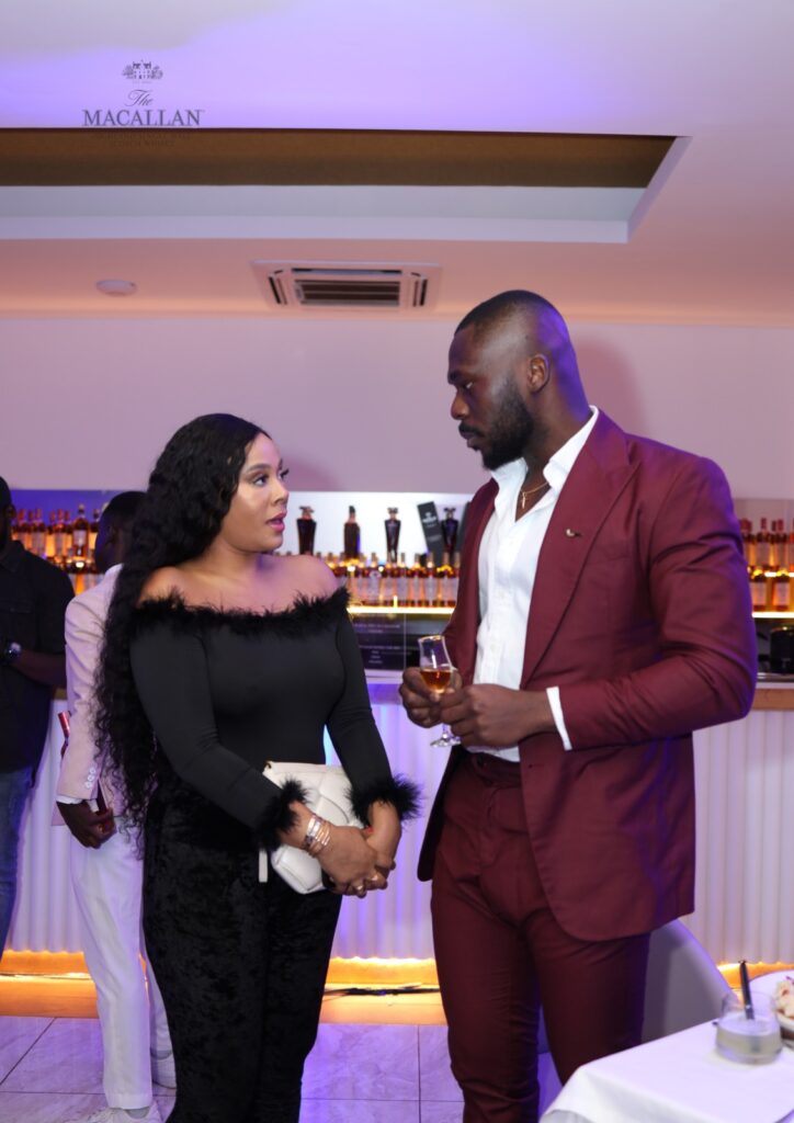 A photo of Haillie Sumney, actresses, chatting with General Manager Play/Lupita Ghana, Agugua Chukwu Dozie