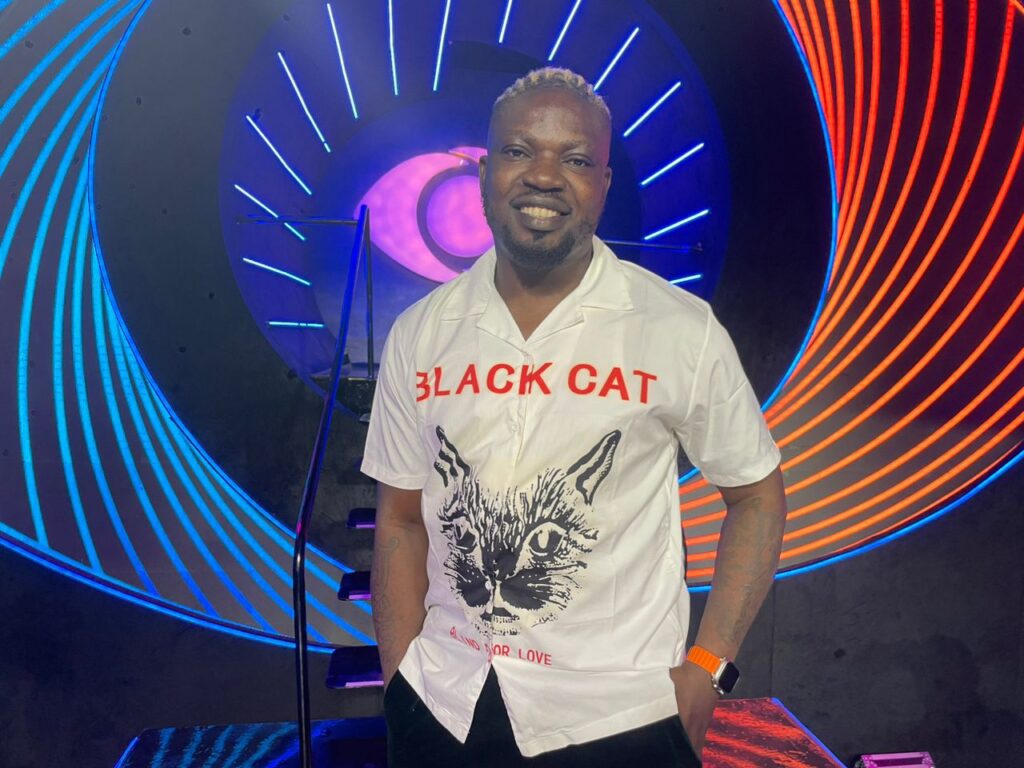Kay Solo, Nigerian Music Producer at BBNaija: The Buzz Studio for Episode 8 of the Buzz with Toke Makinwa