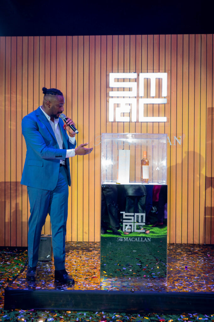 The Macallan Brand Educator and Ambassador, Lagos, Daniel Atteh unveiling The Macallan Harmony III- Amber Meadow